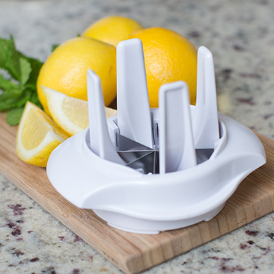 NORPRO<sup>&reg;</sup> Lemon/Lime Slicer - Slice lemons and limes into 8 perfect wedges with this ultra-compact slicer.