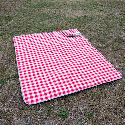 ONIVA<sup>&reg;</sup> Tote Outdoor Picnic Blanket - This Blanket Tote is perfect for the beach or your next picnic! This cozy portable picnic blanket has a soft fleece topside and water-resistant underside that packs compactly into a carry tote. Features a shoulder strap and zippered security pocket. Measuring nearly 21 square feet this outdoor blanket can seat the whole family.